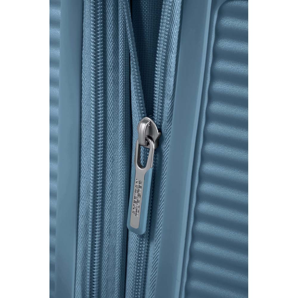 Suitcase American Tourister Soundbox made of polypropylene on 4 wheels 32G*002 Stone Blue (medium)