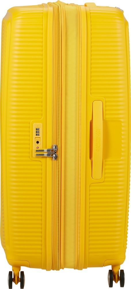 Валіза American Tourister Soundbox із поліпропілену на 4-х колесах 32G*009; Golden Yellow (гігант)