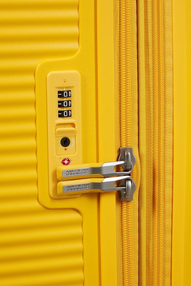 Валіза American Tourister Soundbox із поліпропілену на 4-х колесах 32G*009; Golden Yellow (гігант)