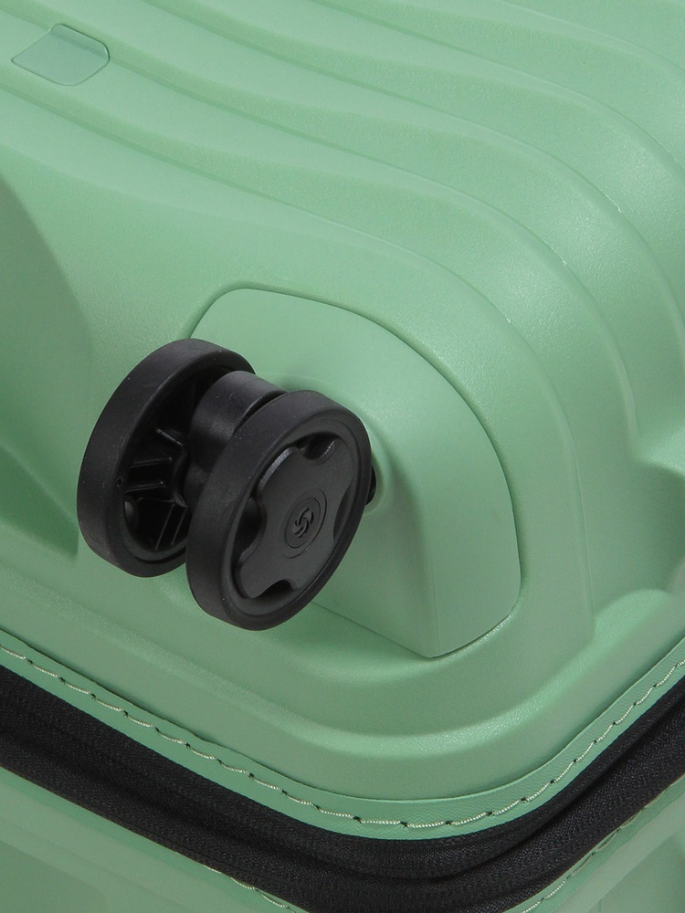 Suitcase Samsonite Upscape made of polypropylene on 4 wheels KJ1*002 Stone Green (medium)