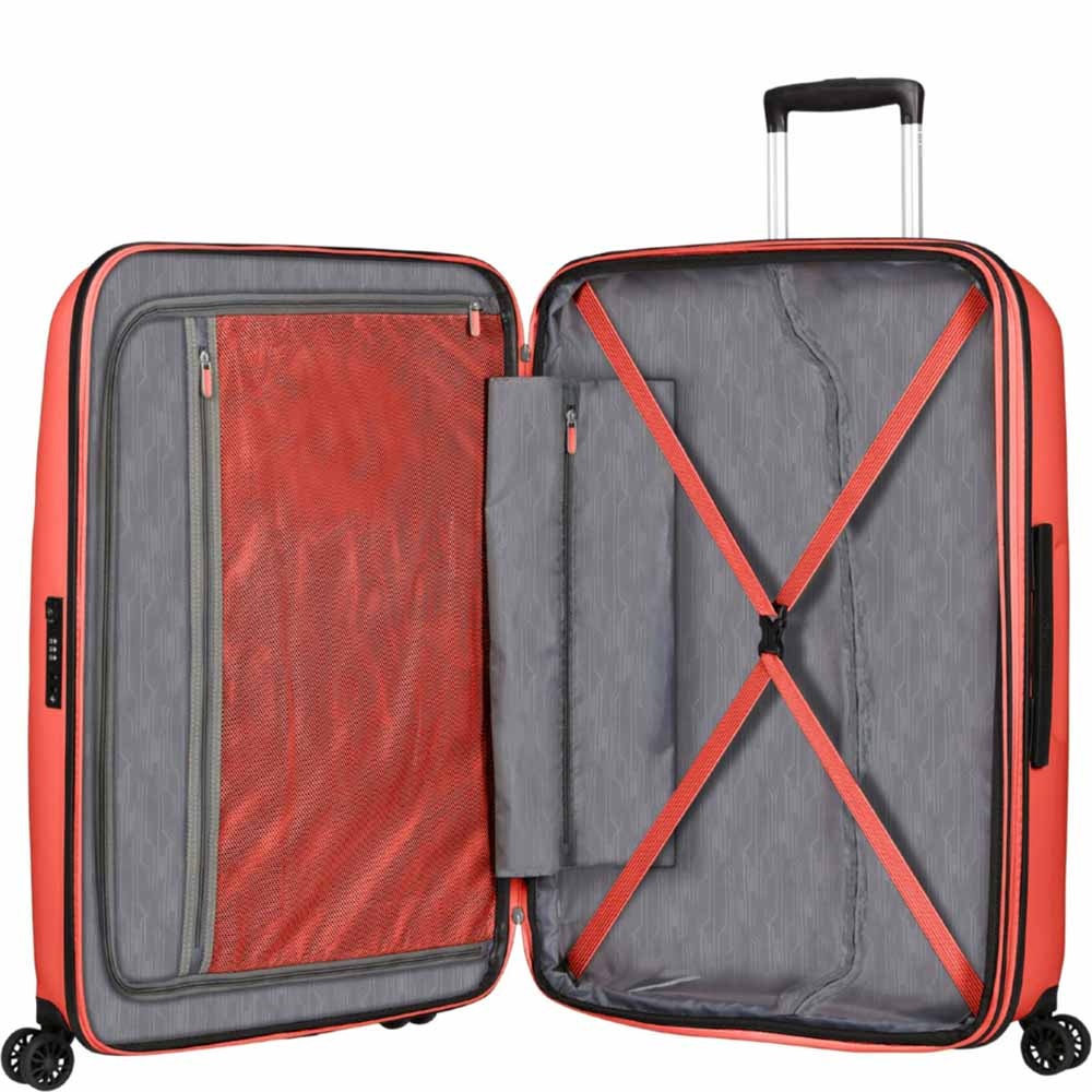 Suitcase American Tourister Bon Air DLX made of polypropylene on 4 wheels MB2 * 003 Flash Coral (large)