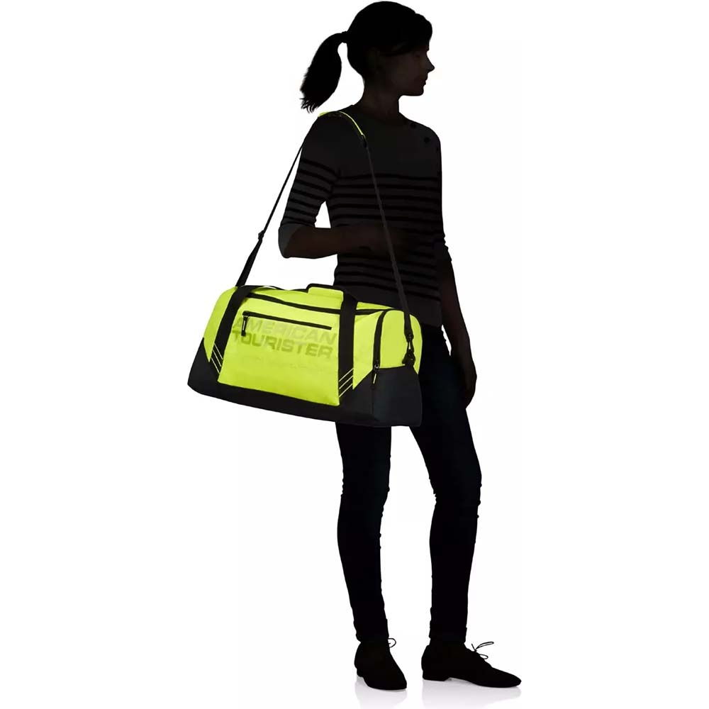Sports and travel bag American Tourister Urban Groove 24G*055 Black/Lime Green (small)