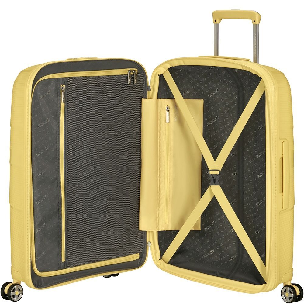 Suitcase American Tourister Starvibe made of polypropylene on 4 wheels MD5*003 Metallic Banana (medium)
