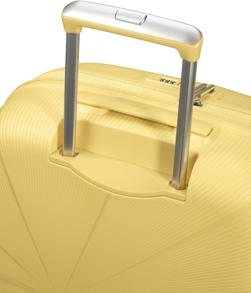 Suitcase American Tourister Starvibe made of polypropylene on 4 wheels MD5*003 Metallic Banana (medium)
